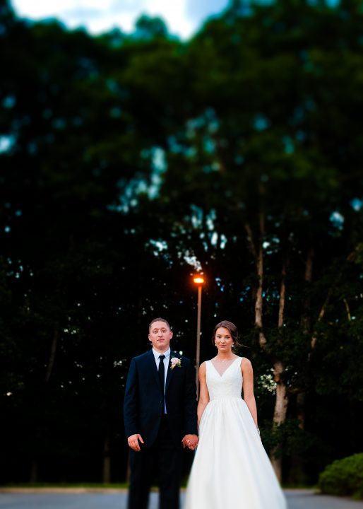 couple holding hands during their biltmore estate wedding 