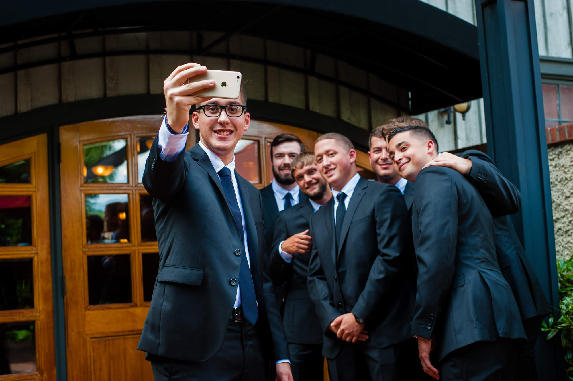 groom and his groomsmen goofing around