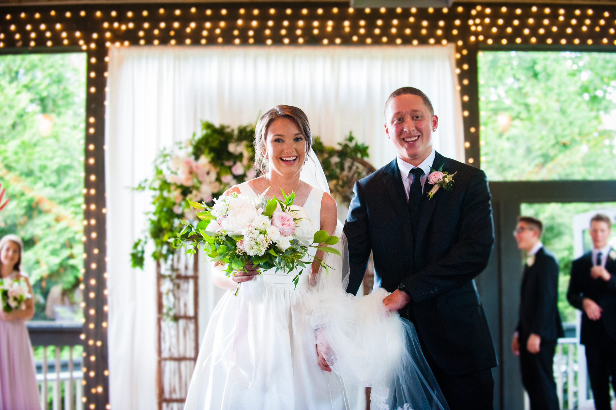 just married bride and groom walk down aisle after their wedding ceremony at Biltmore