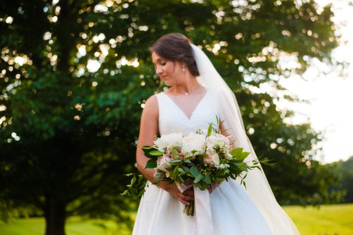 bridal portrait with gorgeous bouquet by Flora