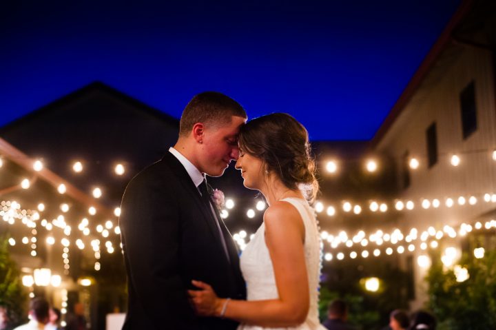 bride and groom night portrait in Lioncrest courtyard