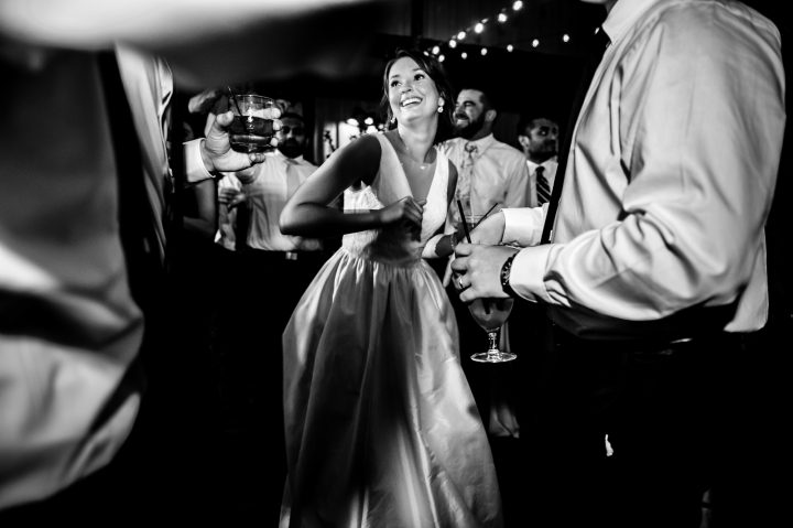 bride dancing during her outdoor reception at biltmore estate