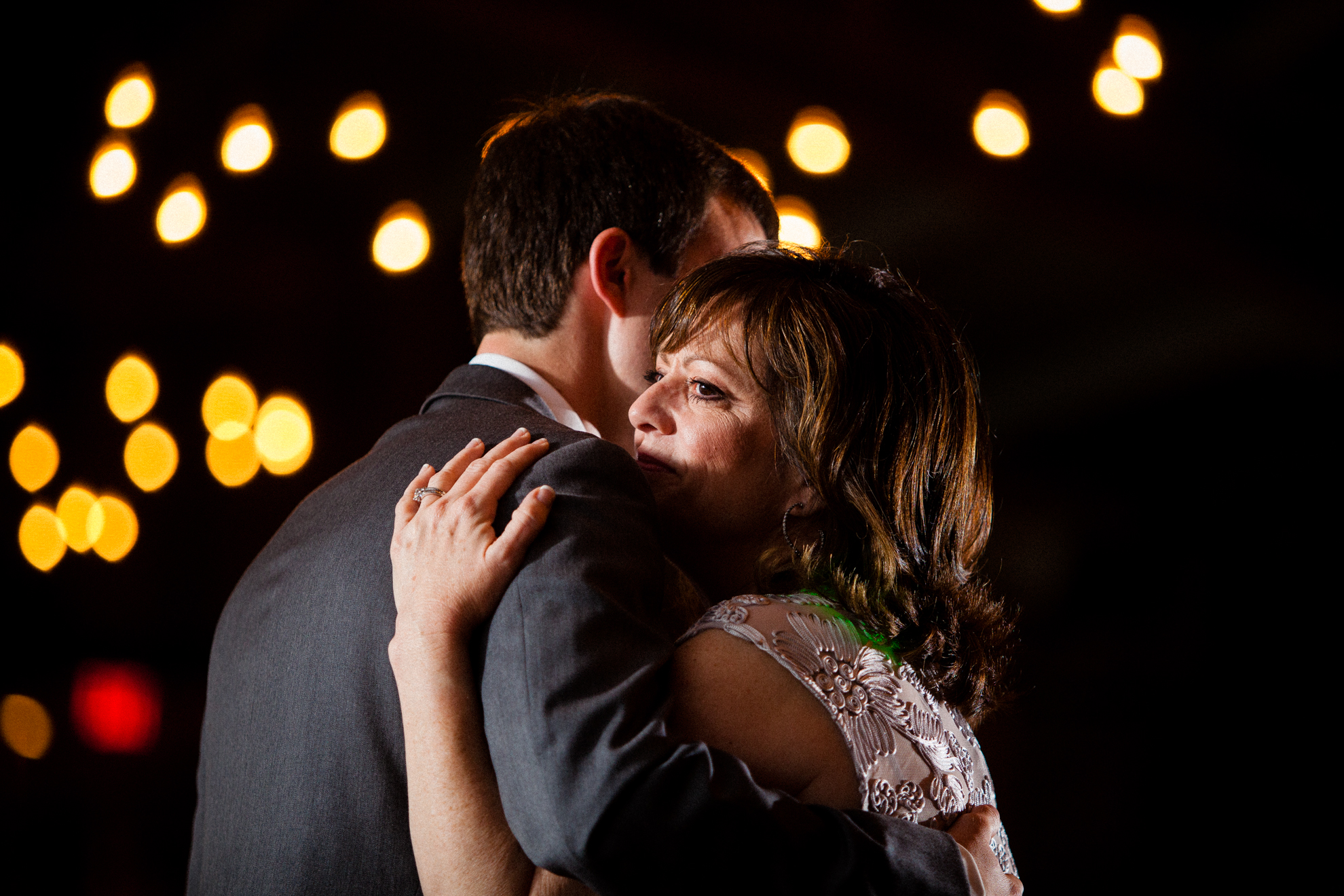 groom and mom dance during wedding reception