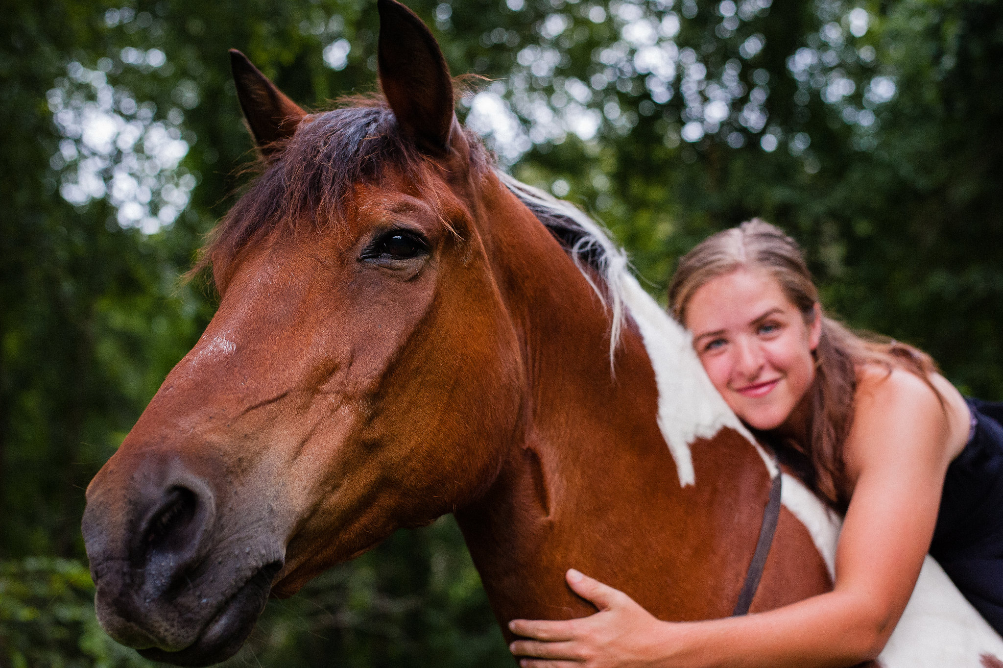 a girl and her horse in tryon