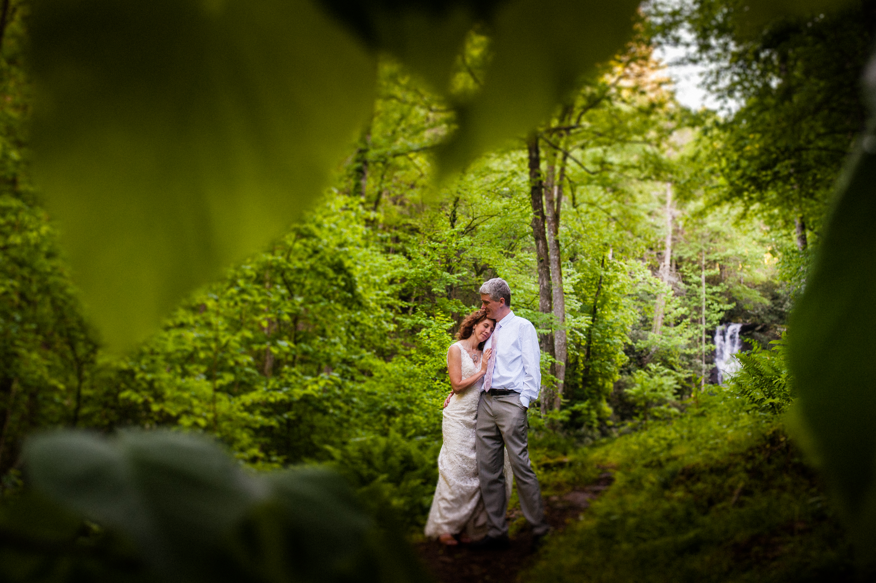 waterfall portraits with bride and groom at Oskar Blues REEB Ranch