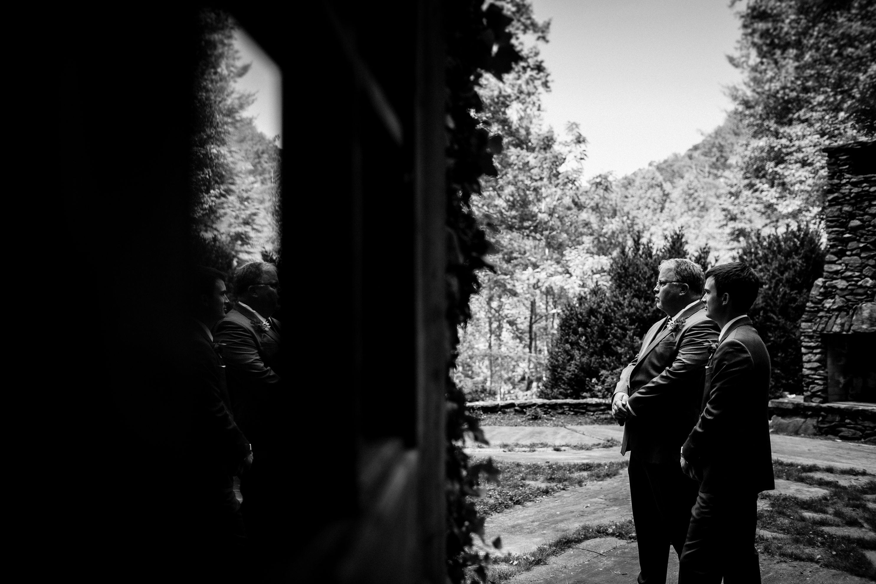 groom waiting for his bride before their mountain wedding ceremony