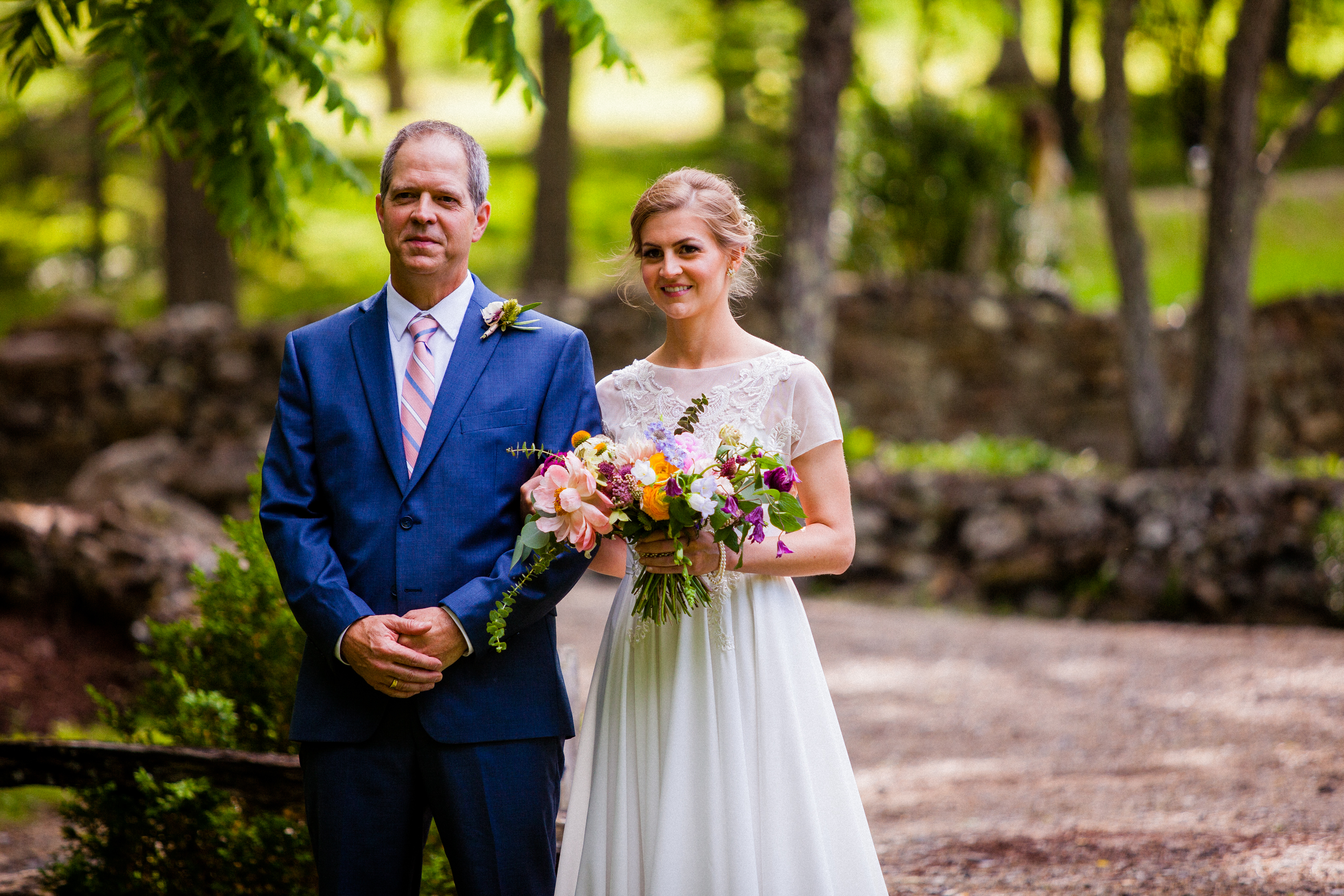 bride and father wait to walk down aisle 