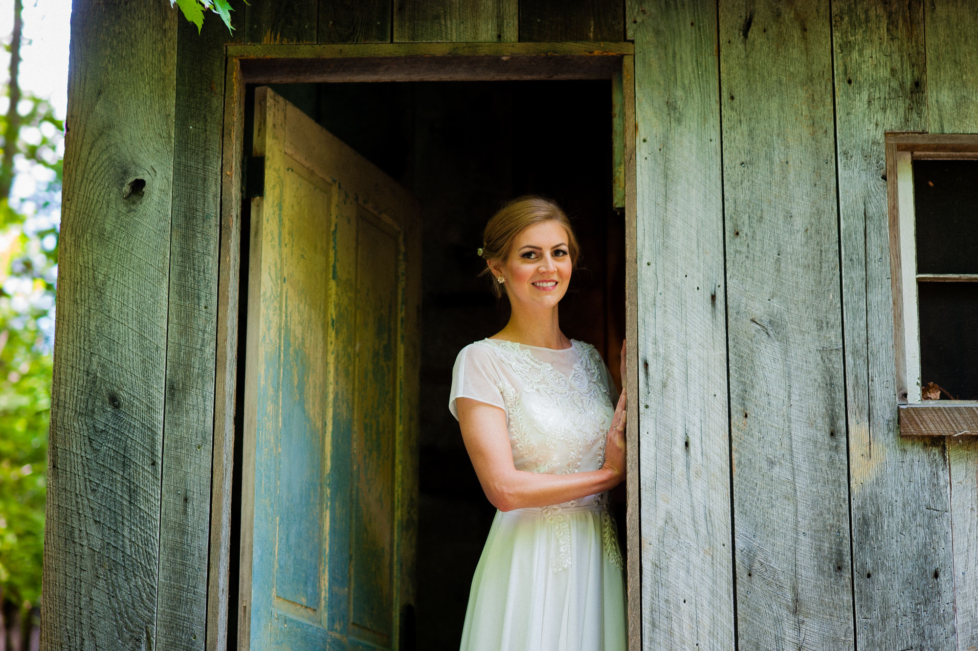 bride in bettys cottage on her wedding day