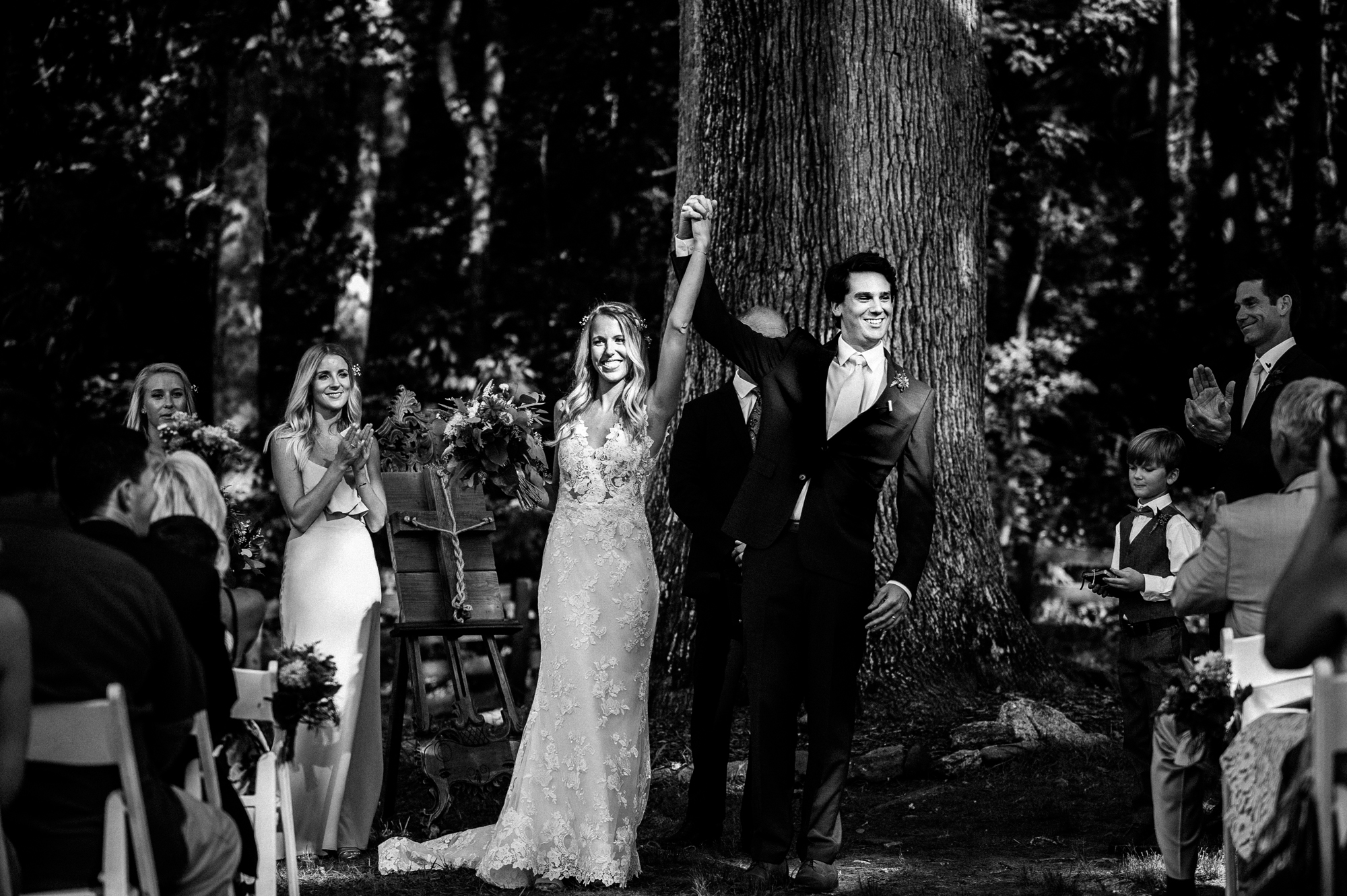 bride and groom cheering post asheville wedding ceremony