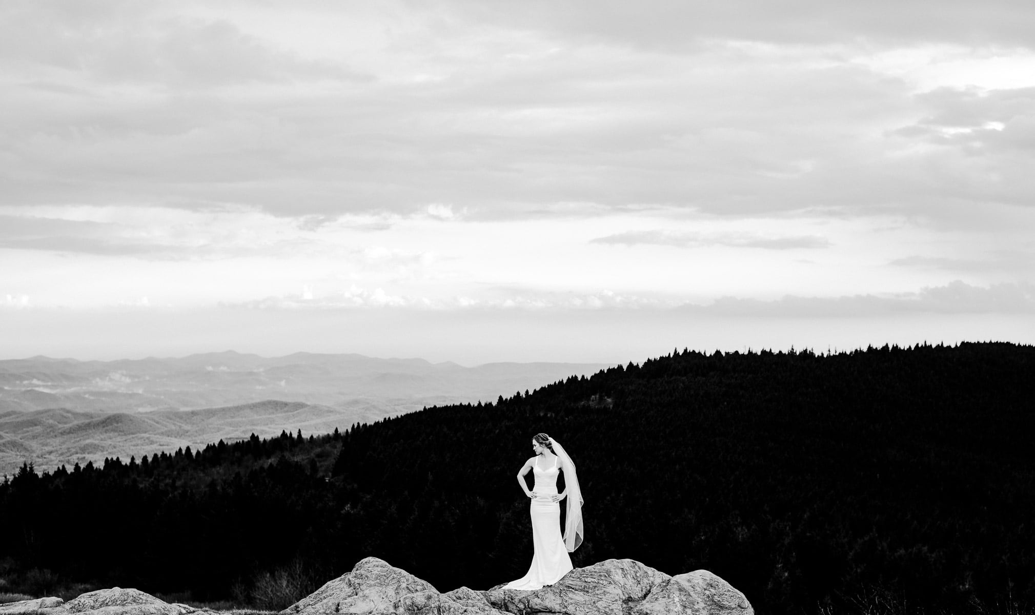 Bride on a rocky mountain during her Black Balsam Elopement 