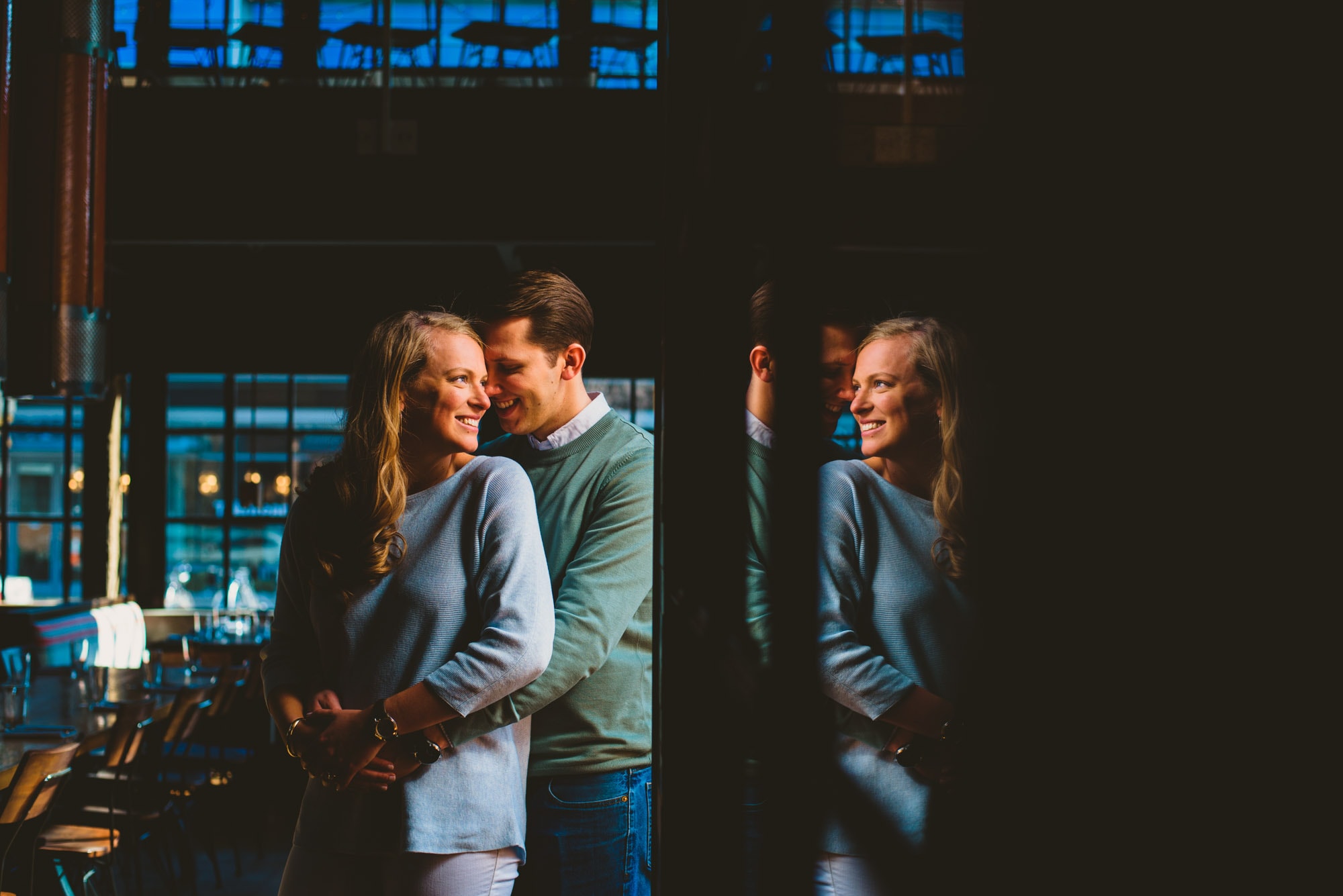 Cool reflections for this image during a couples engagement session at a brewery 