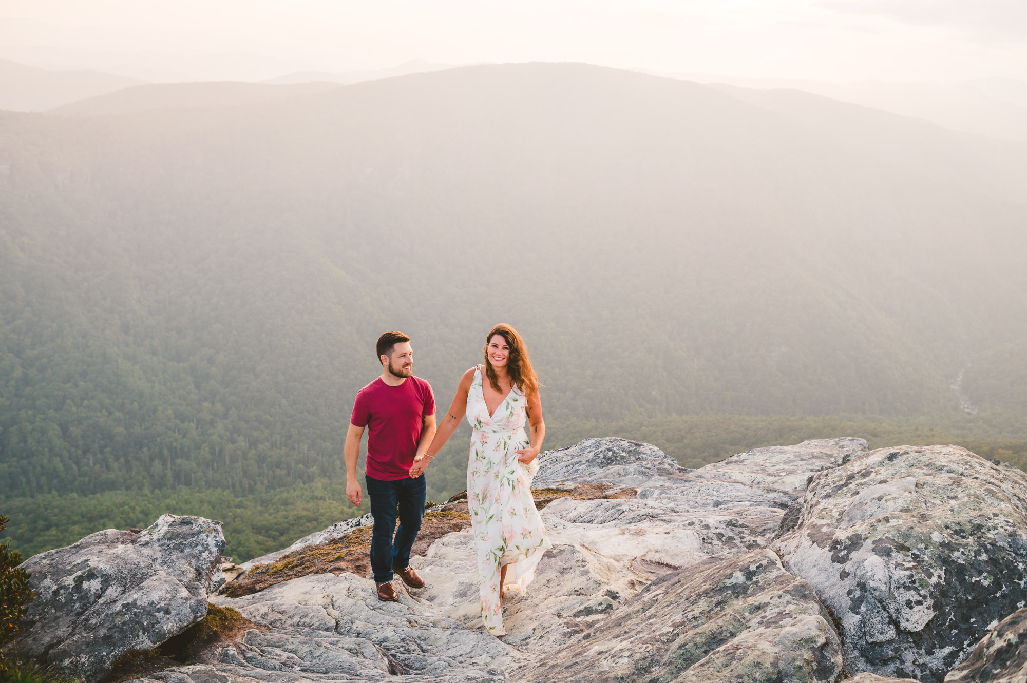 Adventure engagement session on Hawksbill Mountain at sunset 