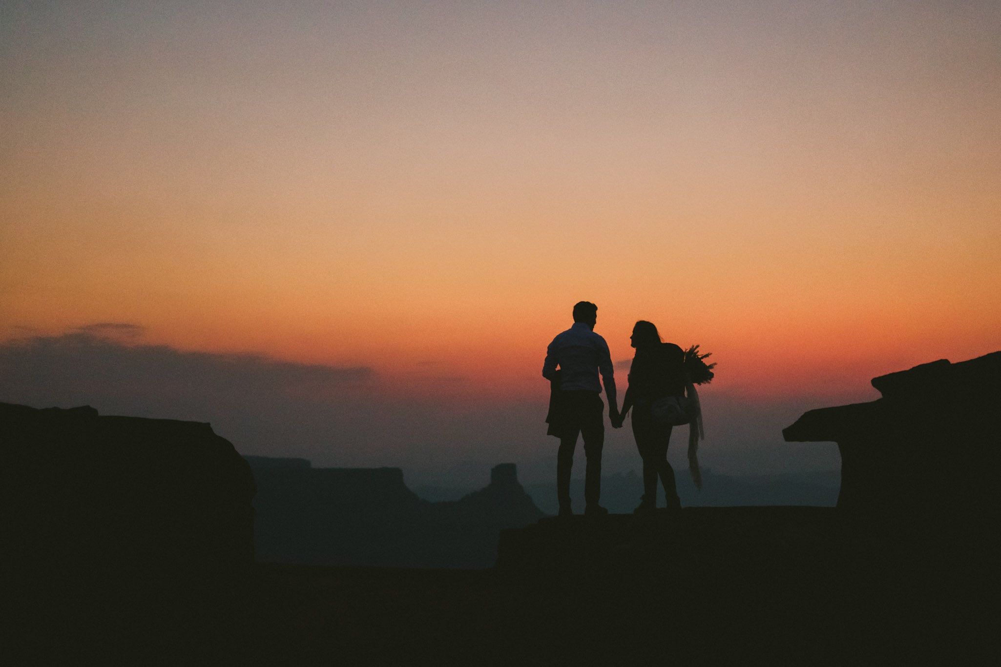 Sunrise hiking elopement Moab Utah