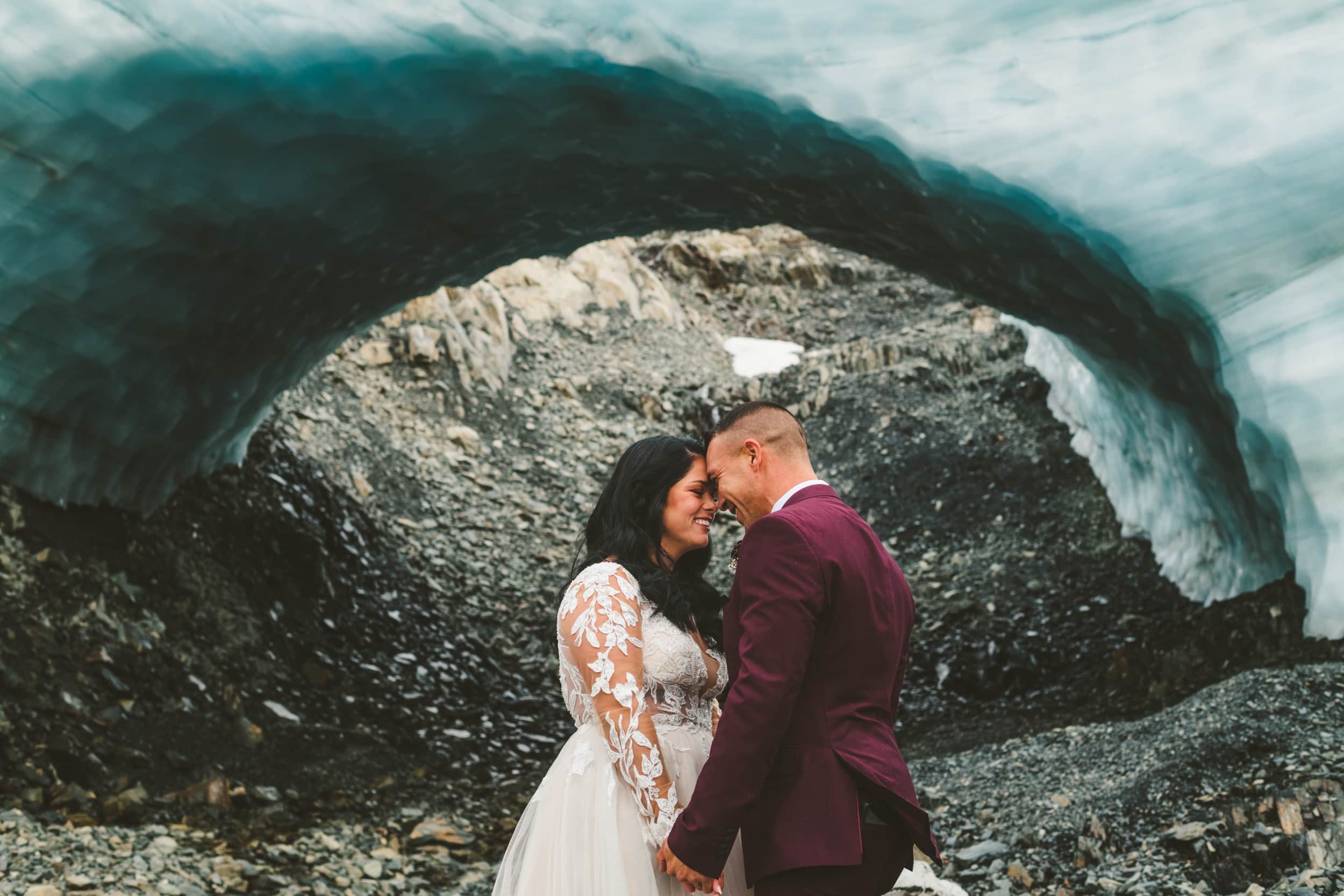 bride and groom embrace during seward alaska glacier elopement 